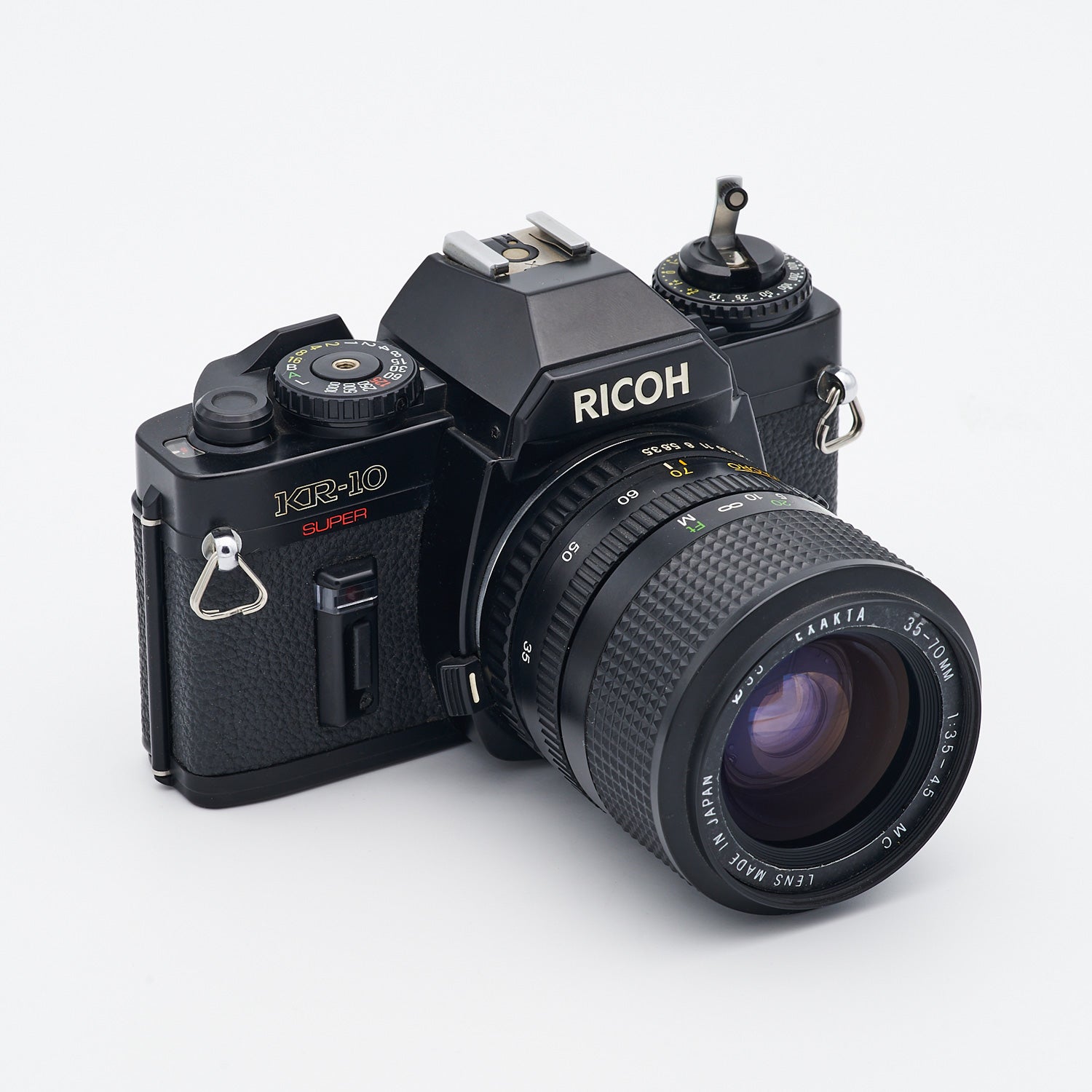 Ricoh KR-10 Super (S/N 79507781) Set inkl. Exakta MC 3.5-4.5/35-70mm Macro (S/N PK586886)