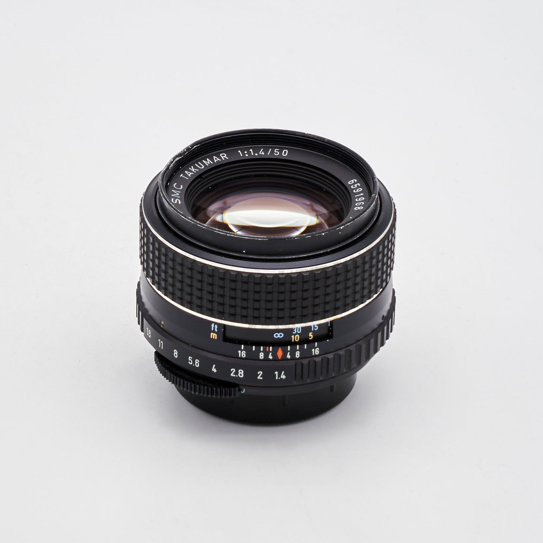 Pentax SMC Takumar 1.4/50mm (M42) (S/N 6591968)